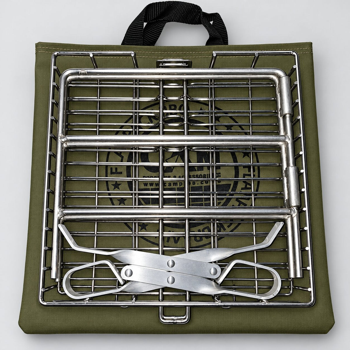 CAM braai grid combo packed flat with stand and tongs inside the grid